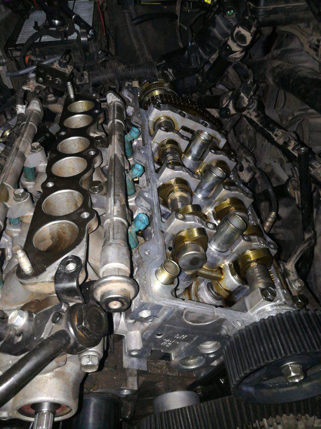 现代圣达菲2006年6缸机可变正时是怎样对正时皮带的凸轮轴后面还有