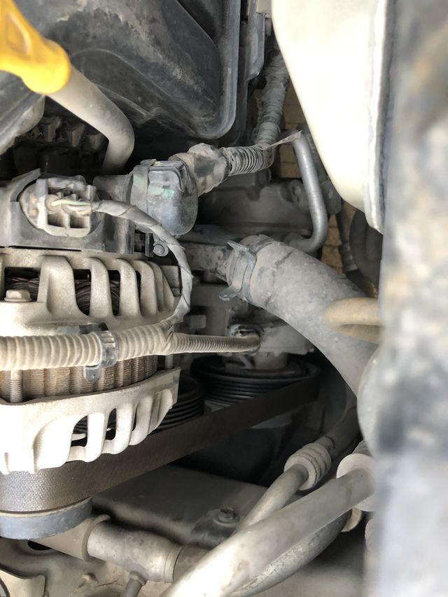 15款的起亚k3空调压缩机和索兰托的压缩一样吗下面图片k3的压缩机型号