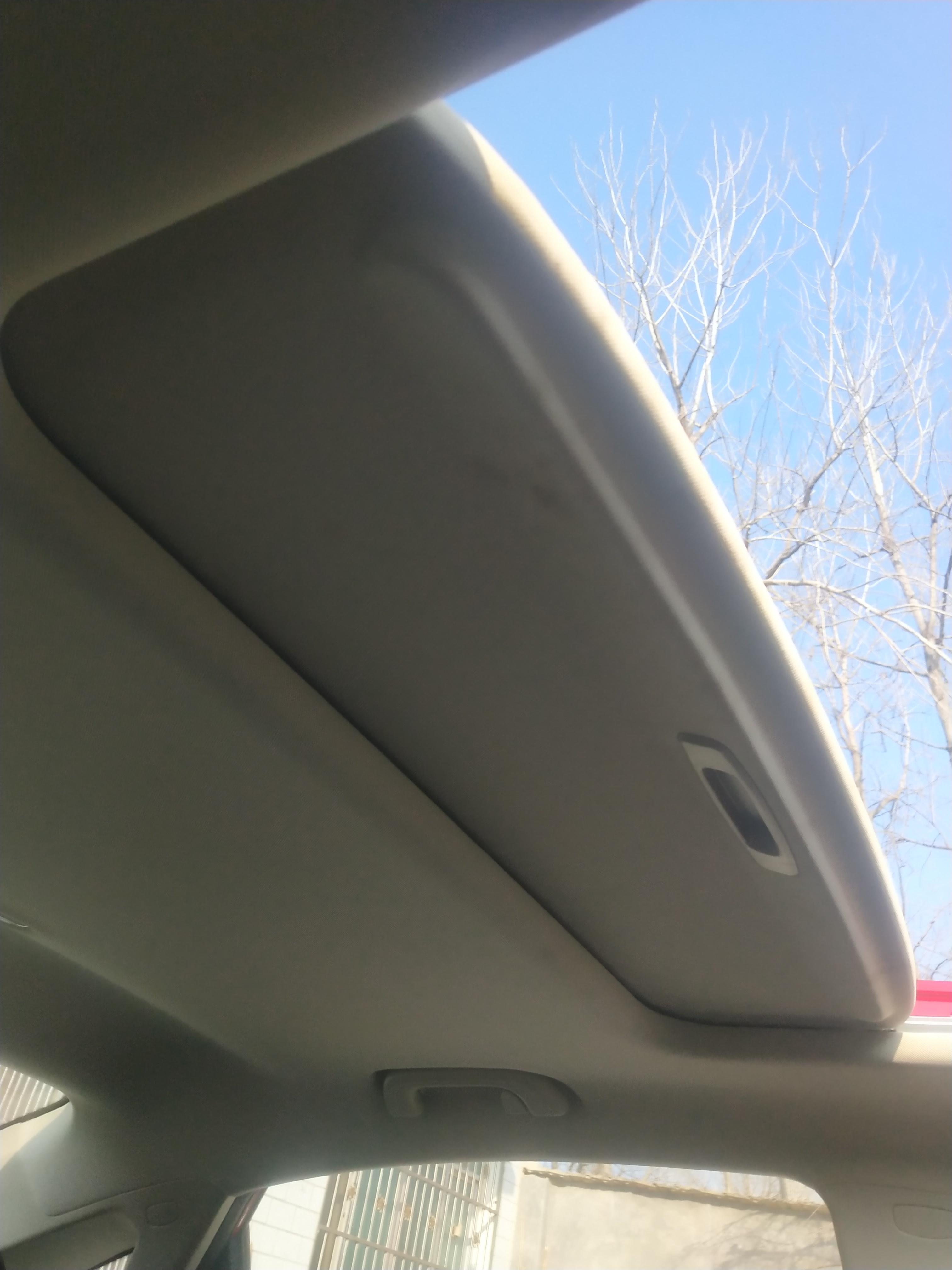 吉利帝豪gl19款汽车天窗遮阳板拉过了回不去怎么弄