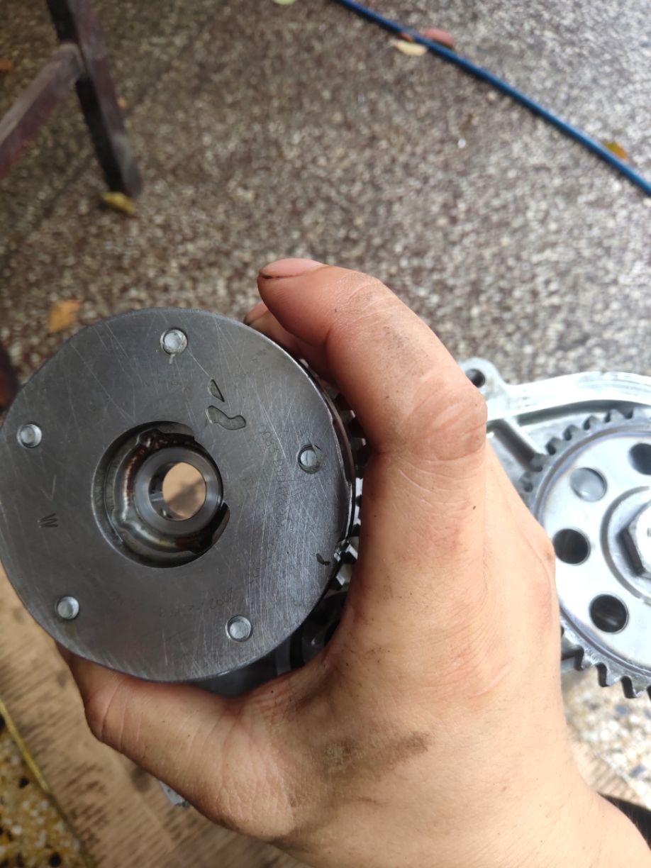 比亚迪速锐15t曲后油封齿圈怎么对位置对多少颗齿