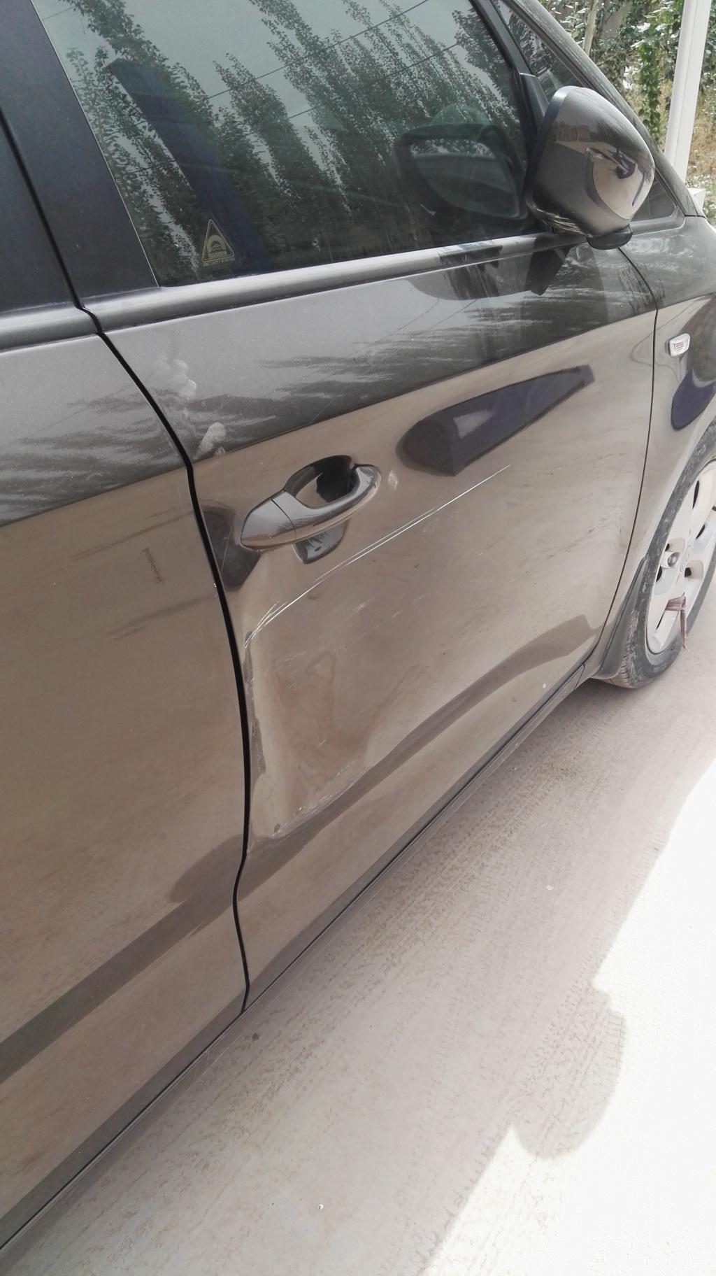 起亚佳乐7座车门损坏怎么维修