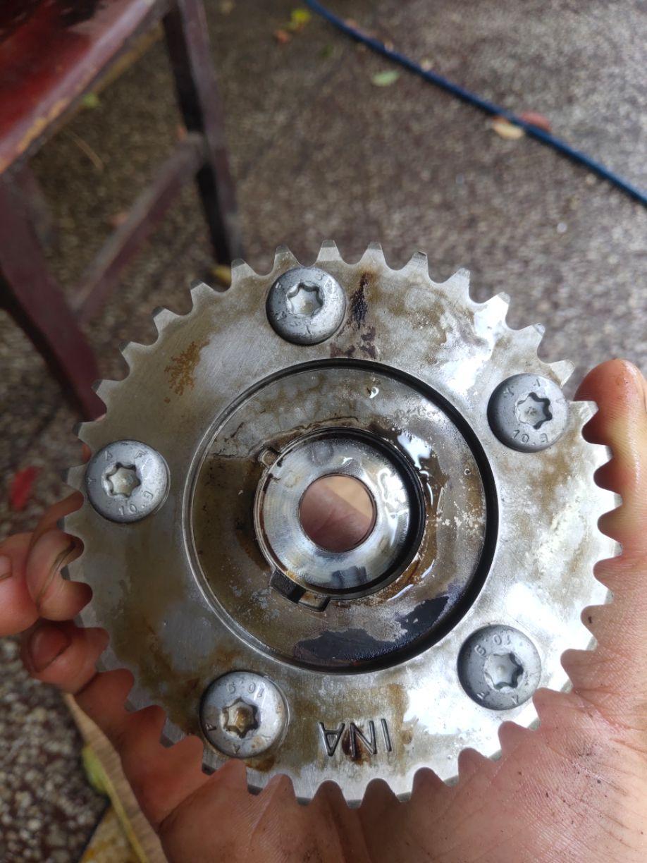 比亚迪速锐15t曲后油封齿圈怎么对位置对多少颗齿